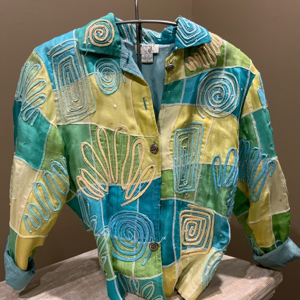 Silk teal and yellow jacket. Yellow top will make this jacket pop